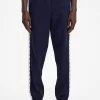 Pantalon de survêtement à bandes pour homme