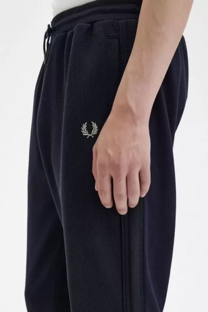 Pantalon de survêtement tricoté à bandes pour homme