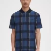Polo à col zippé et motif tartan Glitch pour homme
