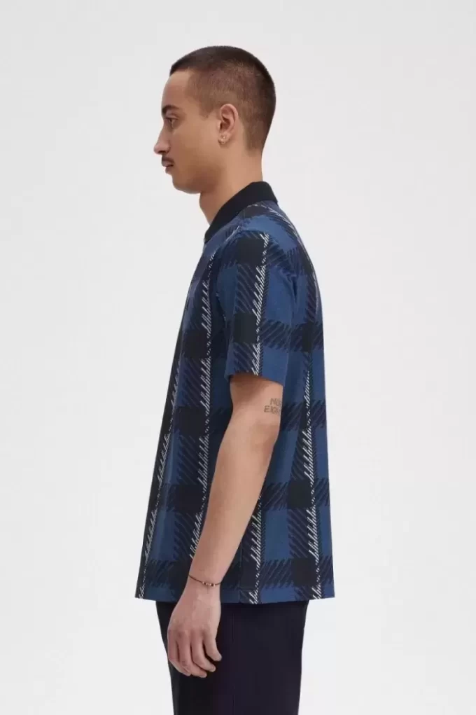 Polo à col zippé et motif tartan Glitch pour homme
