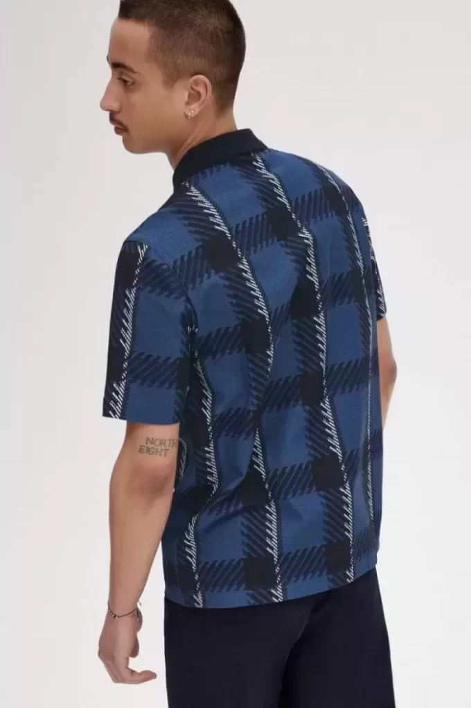Polo à col zippé et motif tartan Glitch pour homme