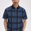 Polo à col zippé et motif tartan Glitch pour homme