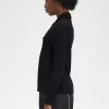 Polo côtelé à manches longues pour femme