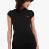 Polo femme en maille métallisée