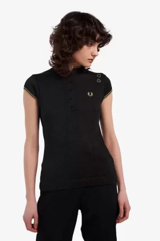 Polo femme en maille métallisée