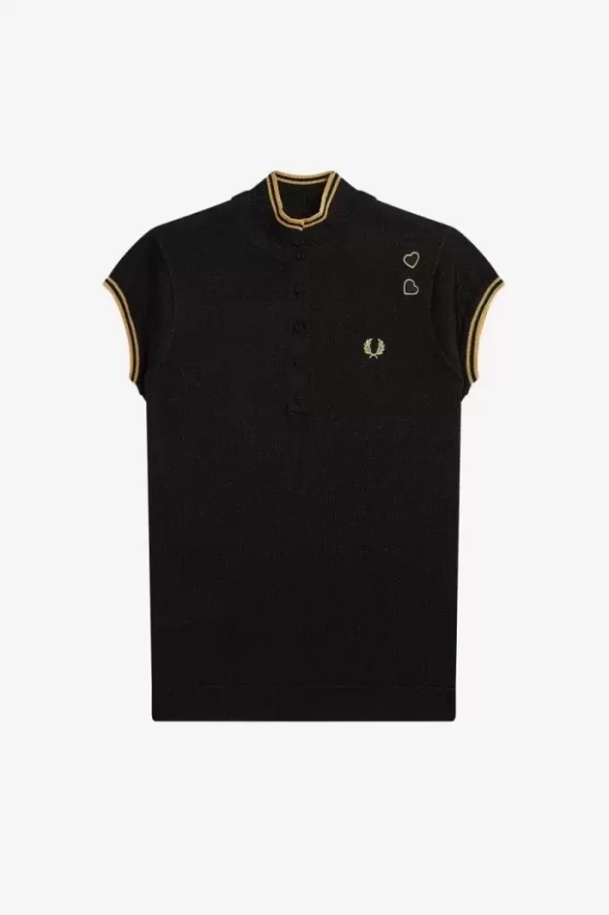 Polo femme en maille métallisée
