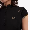 Polo femme en maille métallisée