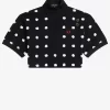 Polo femme en piqué à pois