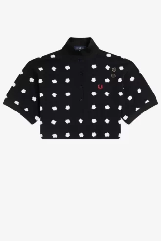 Polo femme en piqué à pois