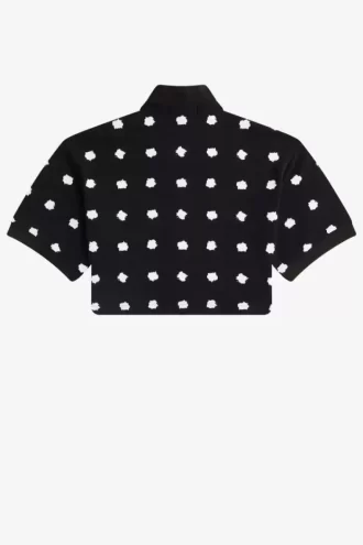 Polo femme en piqué à pois