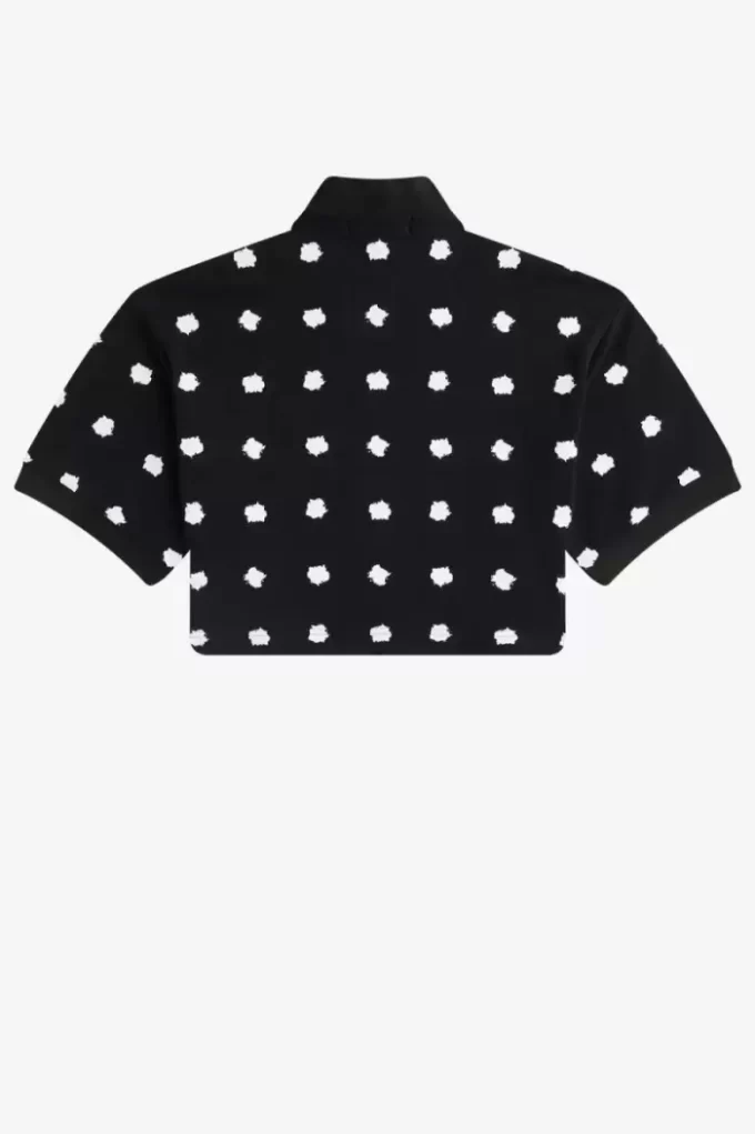 Polo femme en piqué à pois