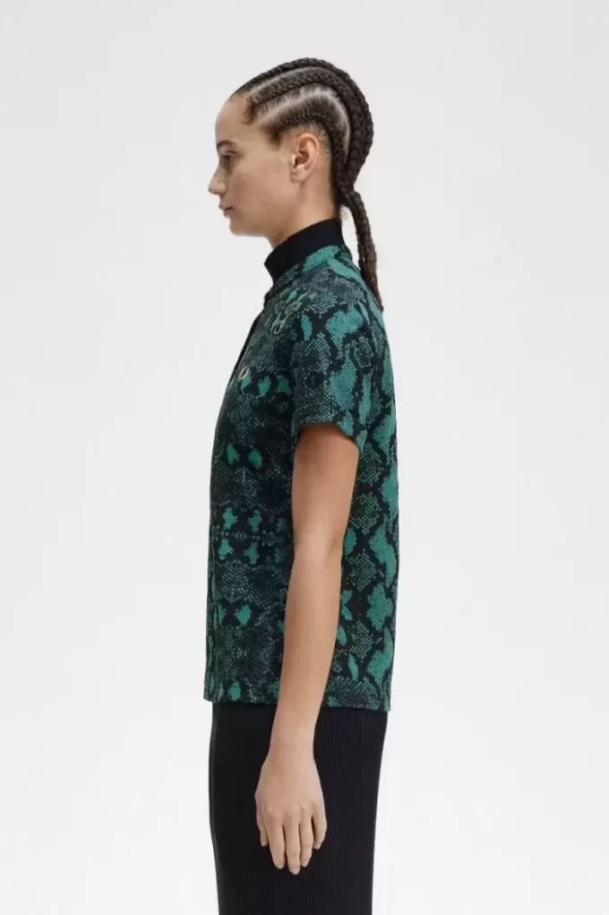 Polo femme à imprimé serpent