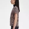 Polo femme à imprimé zèbre