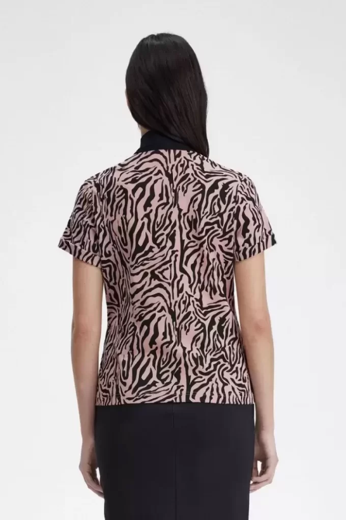 Polo femme à imprimé zèbre