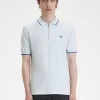 Polo homme en crêpe piqué à col zippé