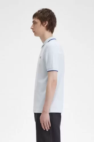 Polo homme en crêpe piqué à col zippé