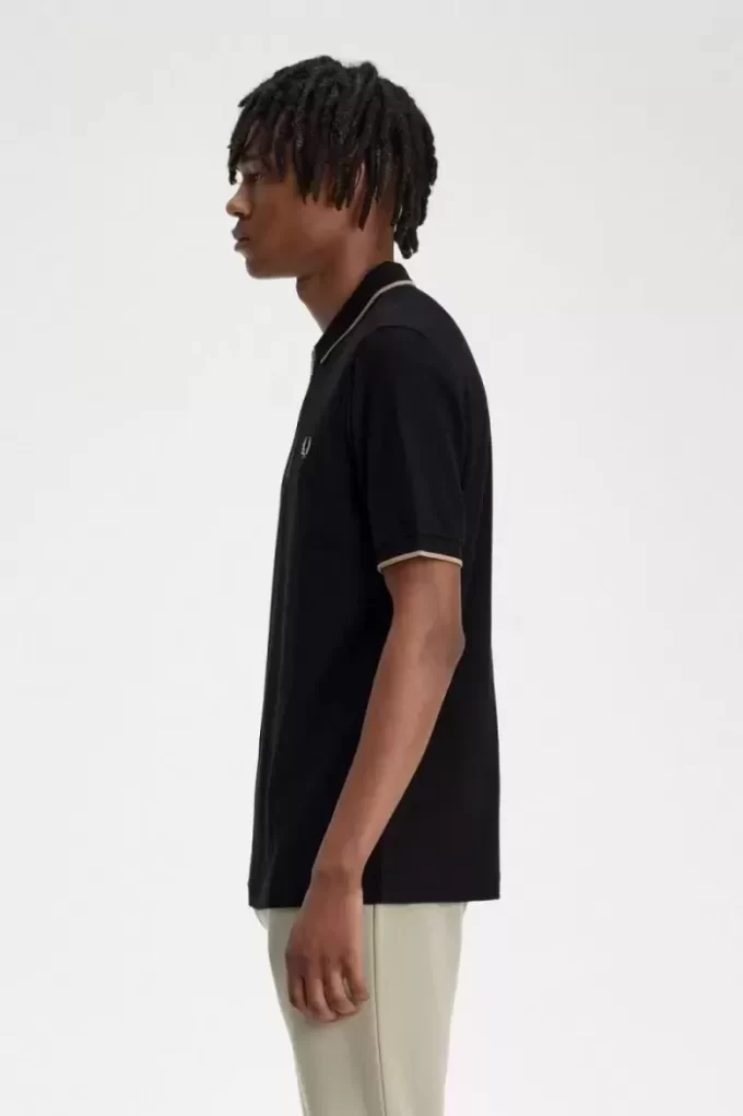 Polo homme en crêpe piqué à col zippé