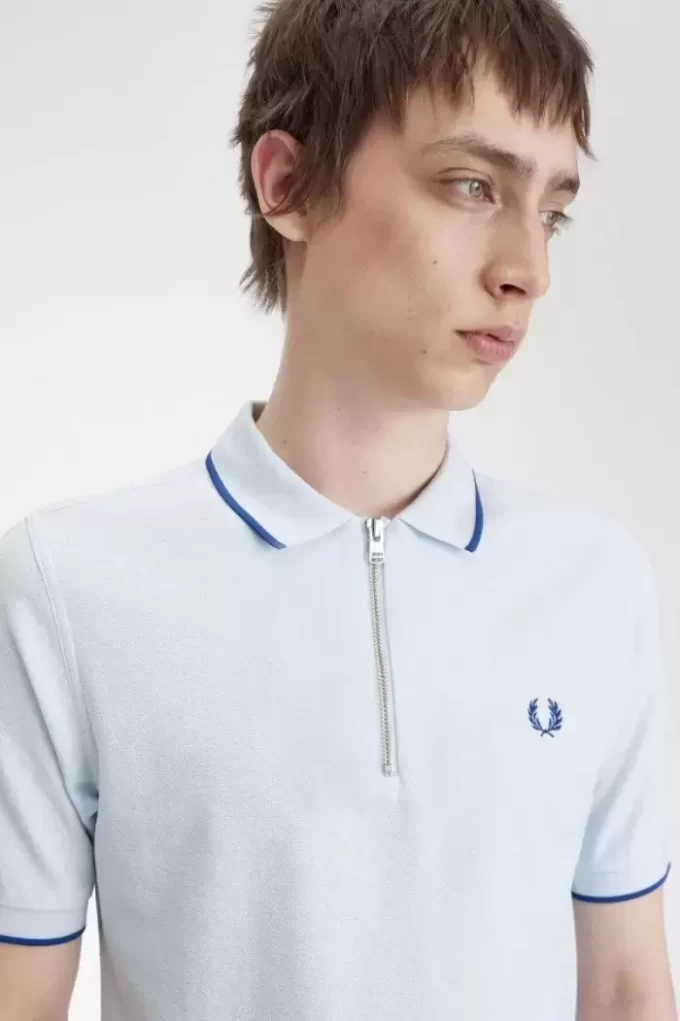 Polo homme en crêpe piqué à col zippé