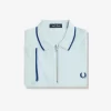 Polo homme en crêpe piqué à col zippé