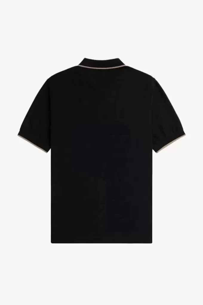 Polo homme en crêpe piqué à col zippé