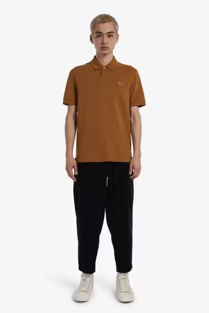 Polo homme à un bouton