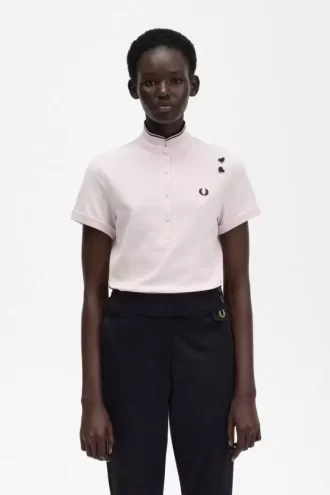 Polo piqué à liseré pour femme