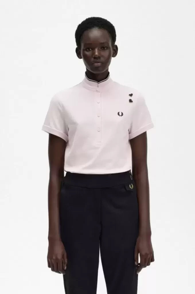 Polo piqué à liseré pour femme