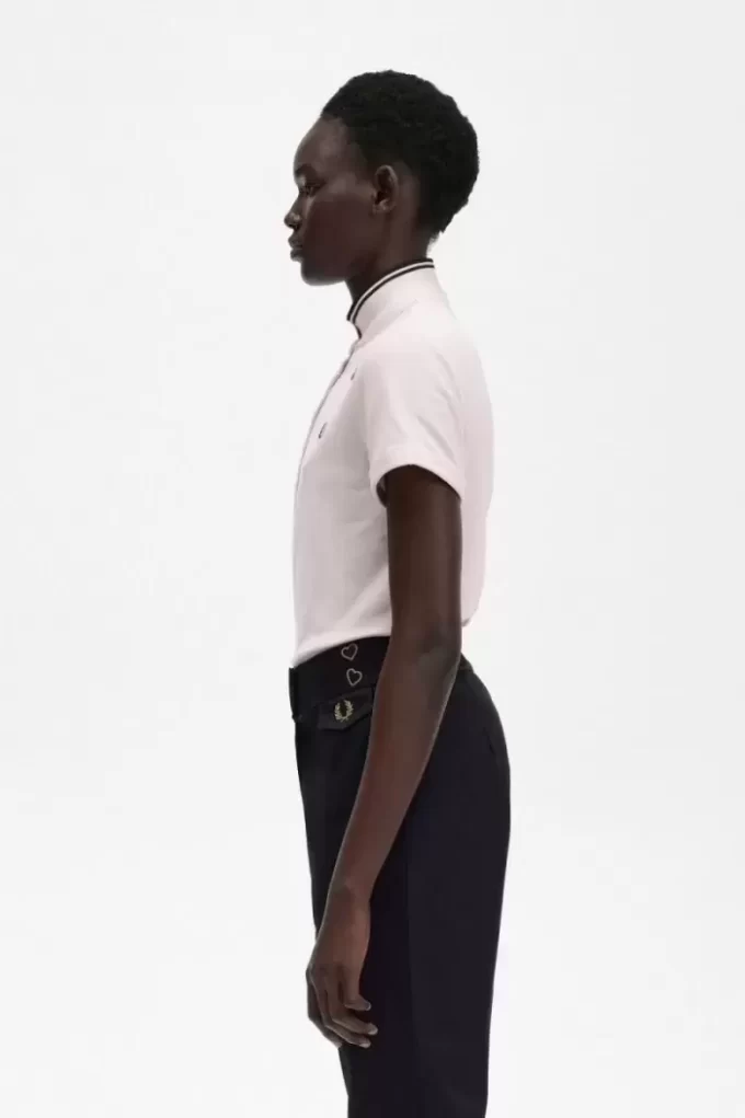 Polo piqué à liseré pour femme