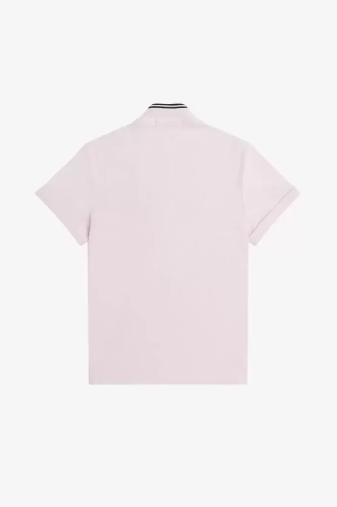 Polo piqué à liseré pour femme