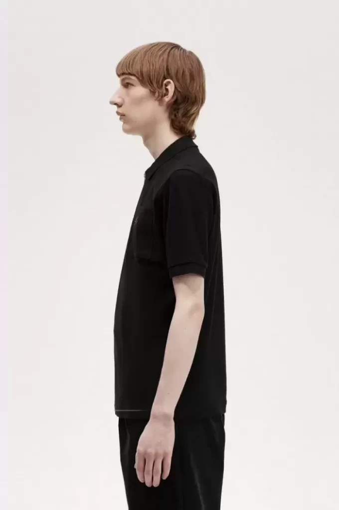 Polo texturé à col zippé pour homme