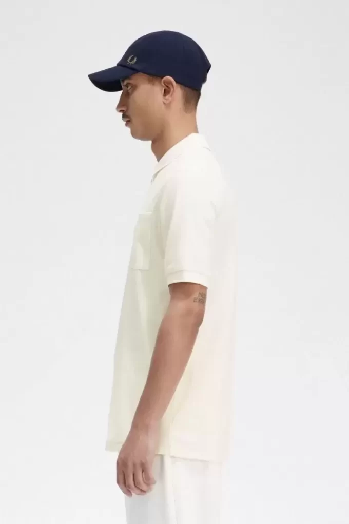 Polo texturé à col zippé pour homme
