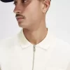 Polo texturé à col zippé pour homme