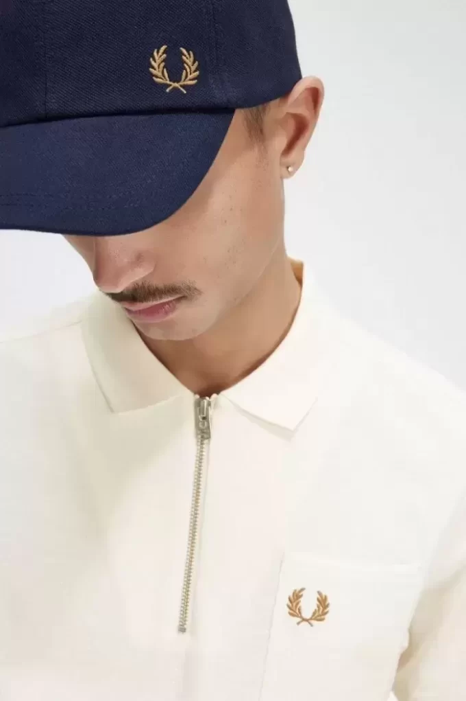 Polo texturé à col zippé pour homme