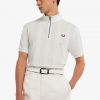 Polos à col zippé et manches raglan