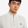 Polos à col zippé et manches raglan