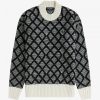 Pull en maille monochrome texturé