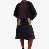 Pull en maille torsadée à empiècements tartan
