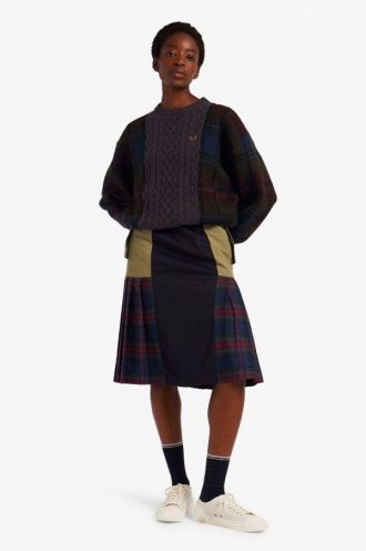 Pull en maille torsadée à empiècements tartan