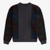 Pull en maille torsadée à empiècements tartan