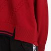 Pull en maille torsadée à ourlet fendu