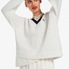 Pull en tricot à col en V et pointes