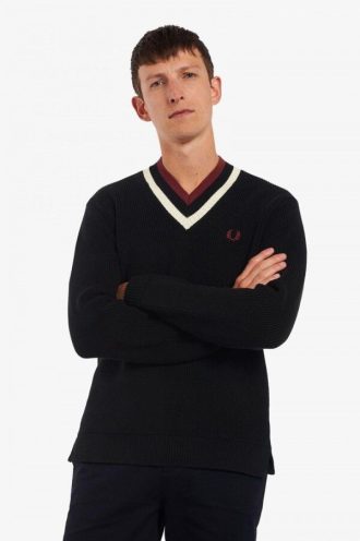 Pull rayé à col en V en maille