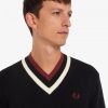 Pull rayé à col en V en maille