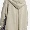 Sweats à capuche avec bande adhésive